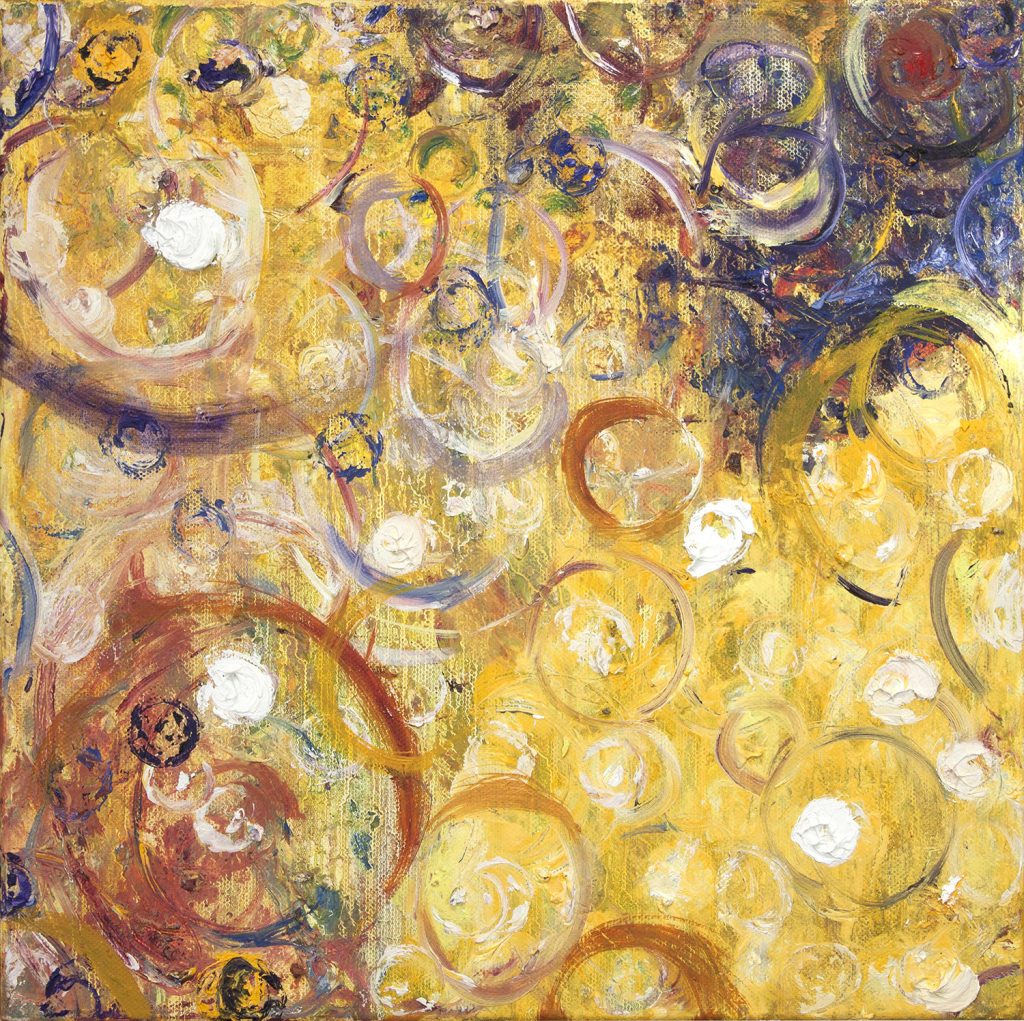 bright yellow abstract background with various sizes of colorful circles