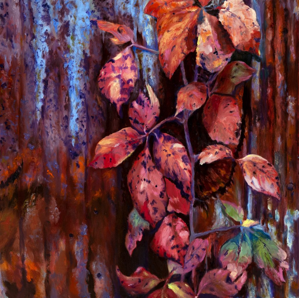 Fall foliage attached to rusted metal siding