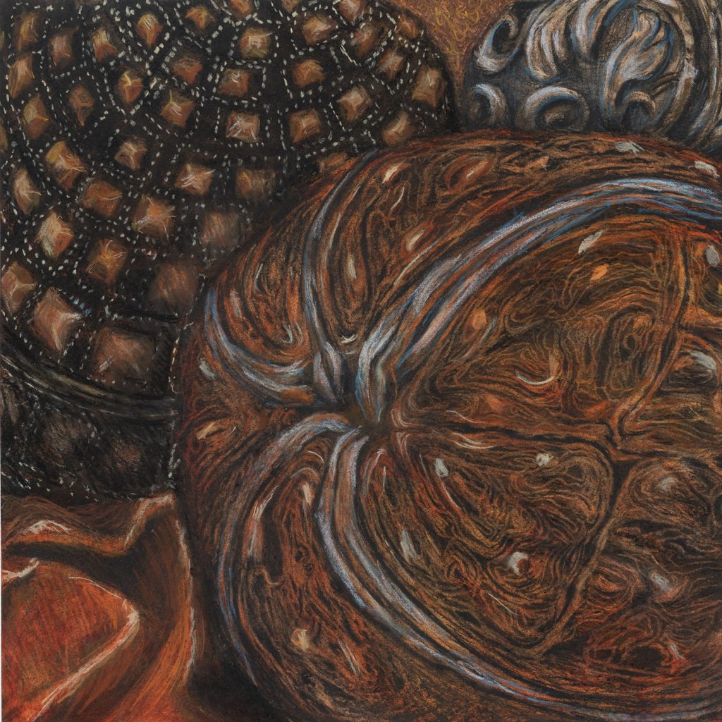 three textural and decorative balls in orange and black