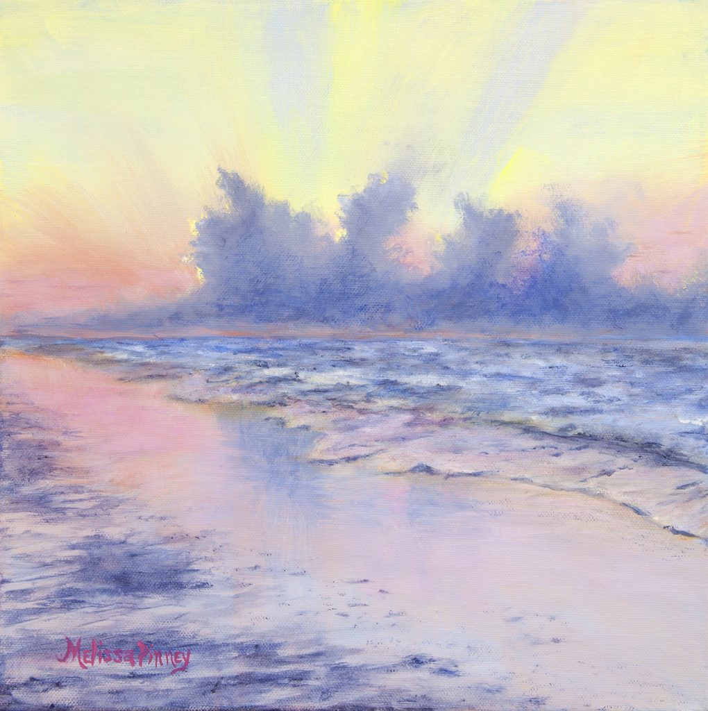 Sunrise behind purple clouds at Hilton Head Island beach